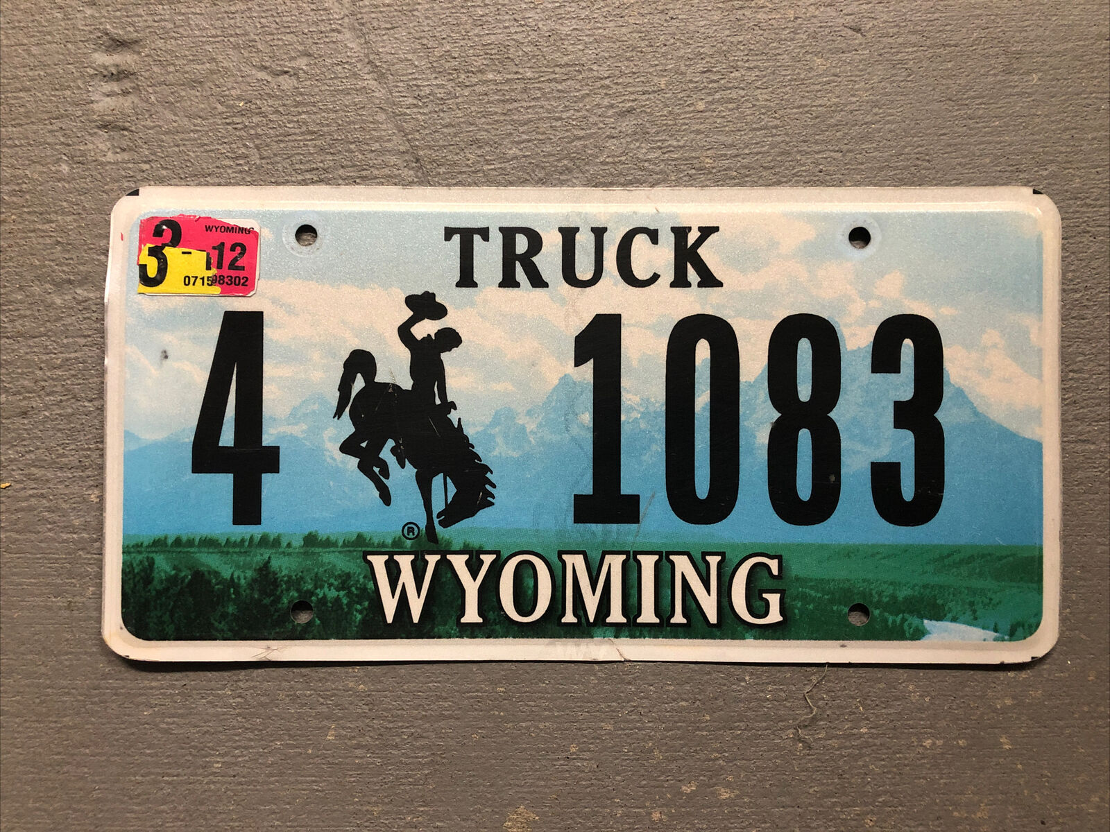 Vintage  Wyoming License Plate Bucking Bronco 4-1083 Truck 2013 Sticker.